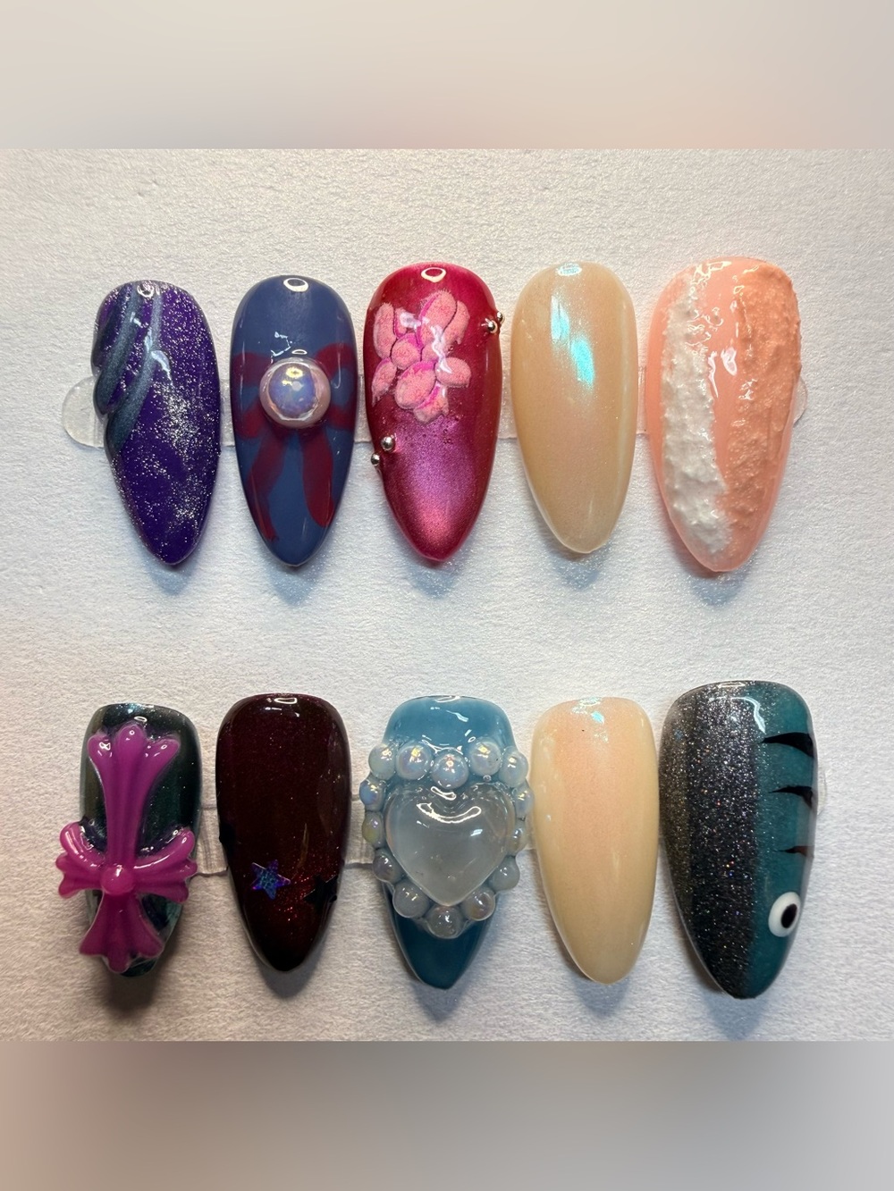 Medium almond Assorted Hand-Painted Nail Art Tips - Pink, Blue, Purple, Peach